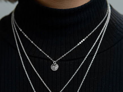 The Rocky Mountains in miniature! This pendant actually shows the ski slopes, and reminds us of the unsurpassed beauty of a snowy mountain scene.5/8”h x 1/2”w sterling silver disc, 1.5mm rolo chain in 16” with extension to 18” Handmade Mountain Circle Winter Mini 1/2” Sterling Silver Pendant