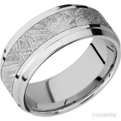 Cobalt chrome 9mm flat, stepped beveled band with meteorite inlay, polish and satin finish.(If your size is not currently available we will order your Lashbrook ring, shipping will take approximately 4 - 6 weeks.) Feel free to email or call us for a specific size or customization. 9 mm wide/Stepped Bevel/Cobalt Chrome band with one 5 mm Centered inlay of Meteorite