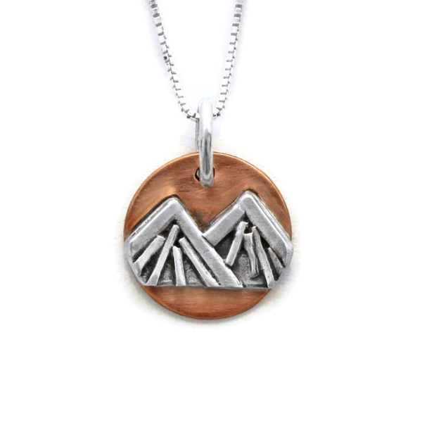 Closeup photo of Handmade Mountain Circle Winter Mini Copper and Sterling Silver Pendant