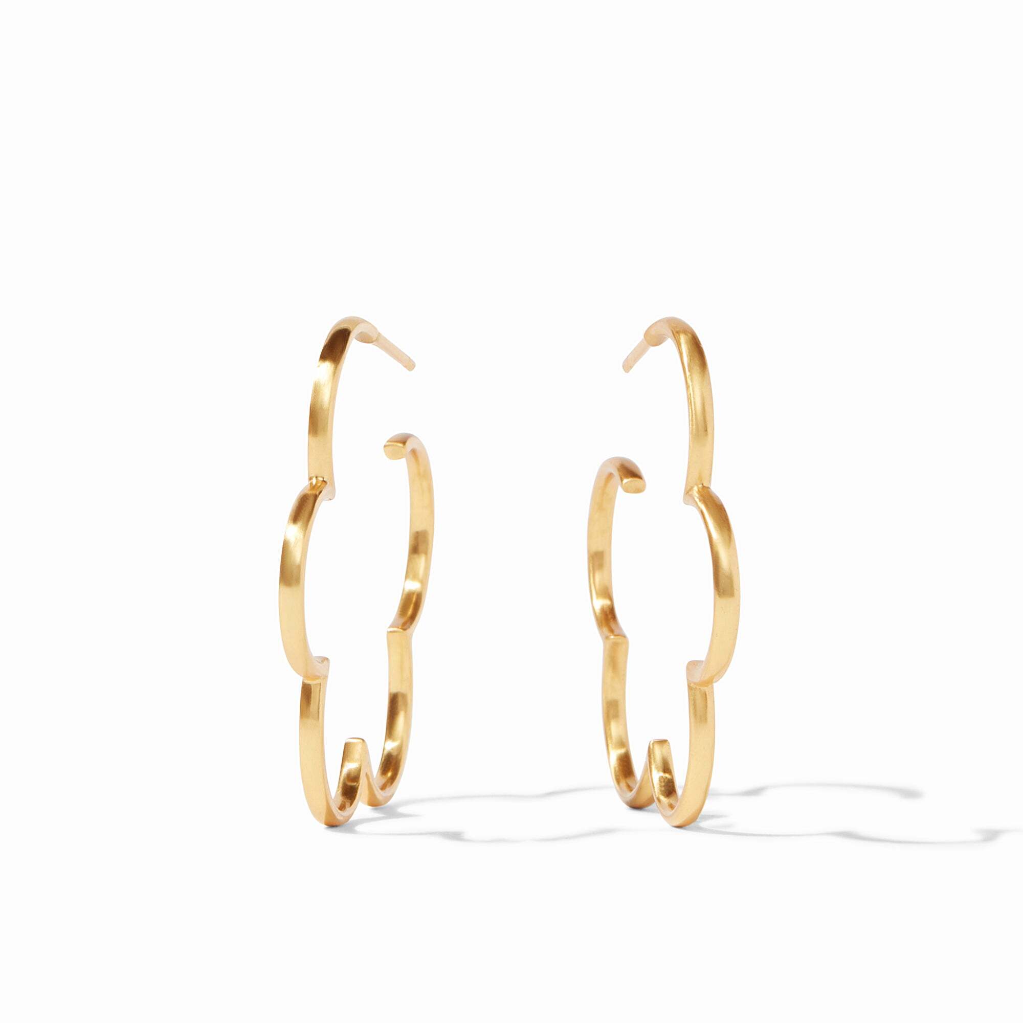 A floral silhouette lends a playful spin to a slender hoop. Gardenia Hoop
