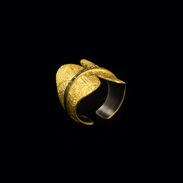 Closeup photo of DI .05 Butterfly SS and Gold Adjustable Ring