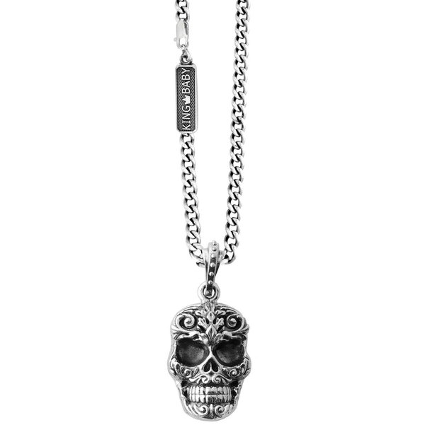 Closeup photo of Carved Baroque Skull Pendant on 24 in. Fine Curb Link Chain