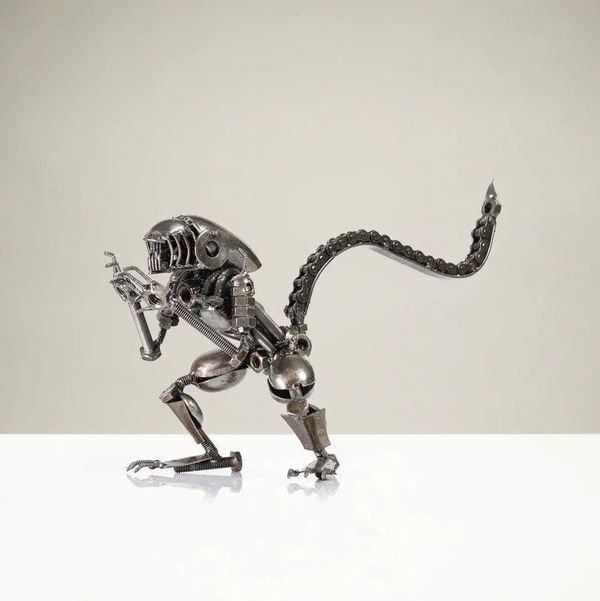 Closeup photo of Alien Inspired Recycled Metal Sculpture