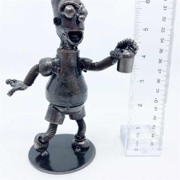 Closeup photo of Bart Simpson Metal Figurine