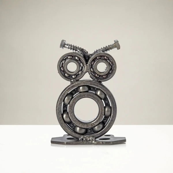 Closeup photo of Owl Recycled Metal Sculpture