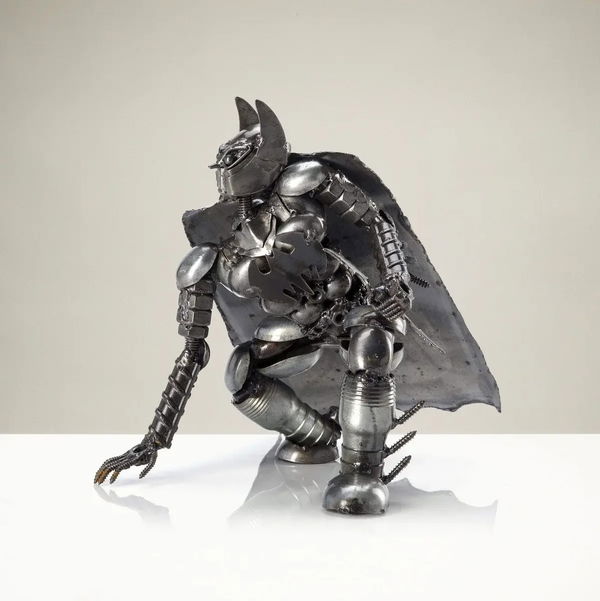 Closeup photo of Batman with Batarang Inspired Recycled Metal Sculpture