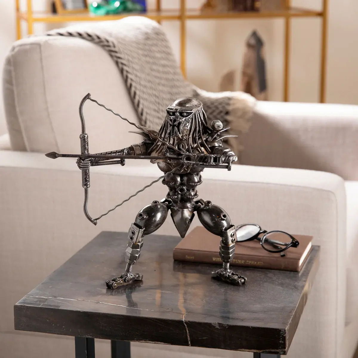 Predator with Bow and Arrow Inspired Recycled Metal Sculpture