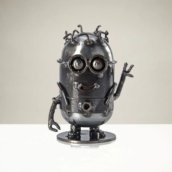 Closeup photo of Minion Victory Inspired Recycled Metal Sculpture