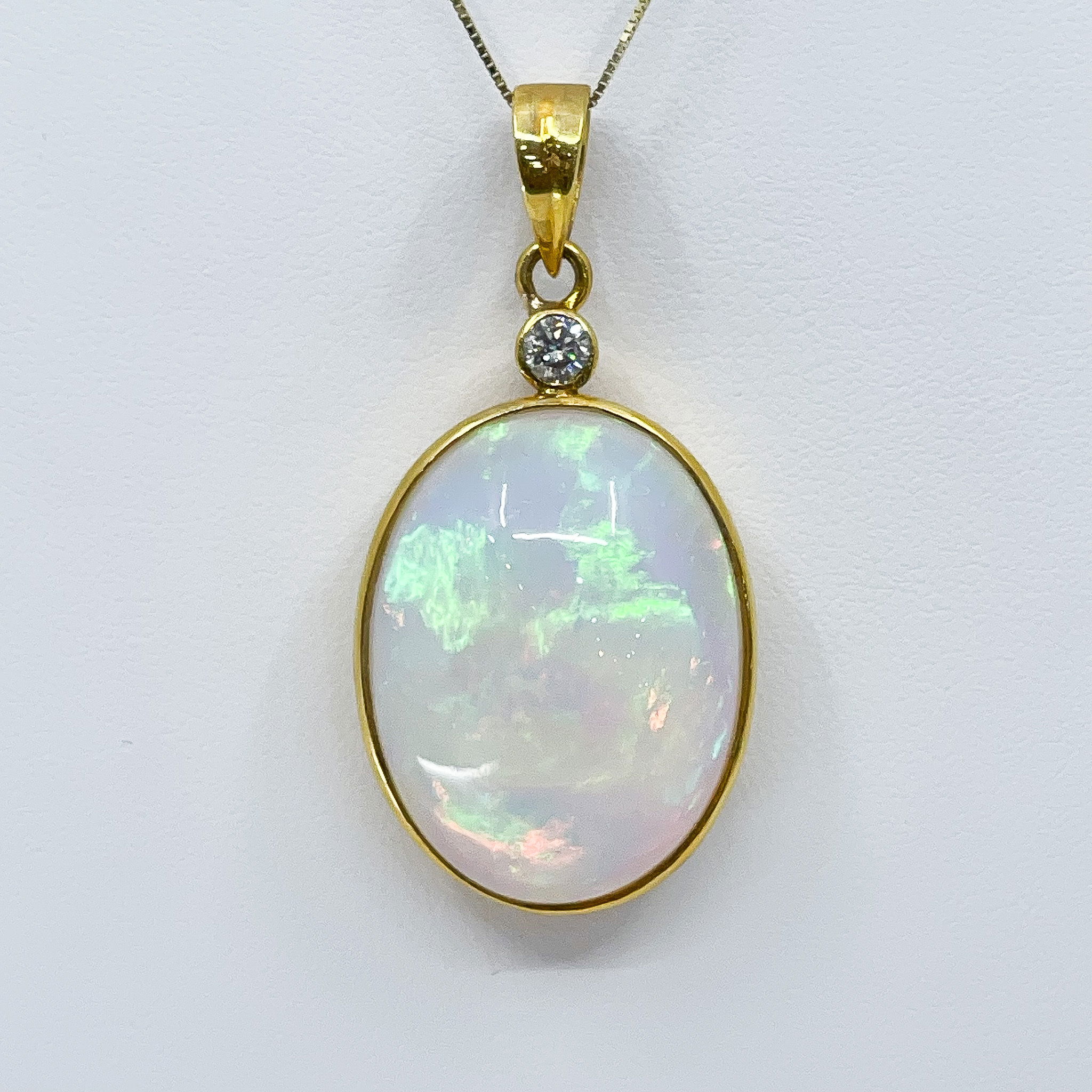 Chain Sold Separately 14ky 33.24ct Ethiopian Opal Pendant with 0.22ct Diamond