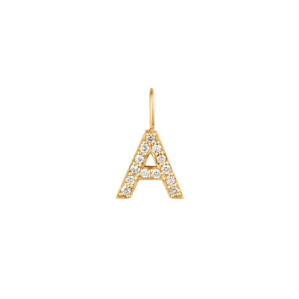 The Diamond Initial Charm will add a touch of sparkle to your look. Each design is dainty, modern and playful. You’ll have so much fun personalizing, styling, stacking and showing off each piece.Material: 14K Solid GoldLetter Dimension: 6.5mm*6mmRing Diameter: 4mm*2.6mmStone Type: DiamondTotal Carat Weight: 0.065ct A | Diamond Initial Charm