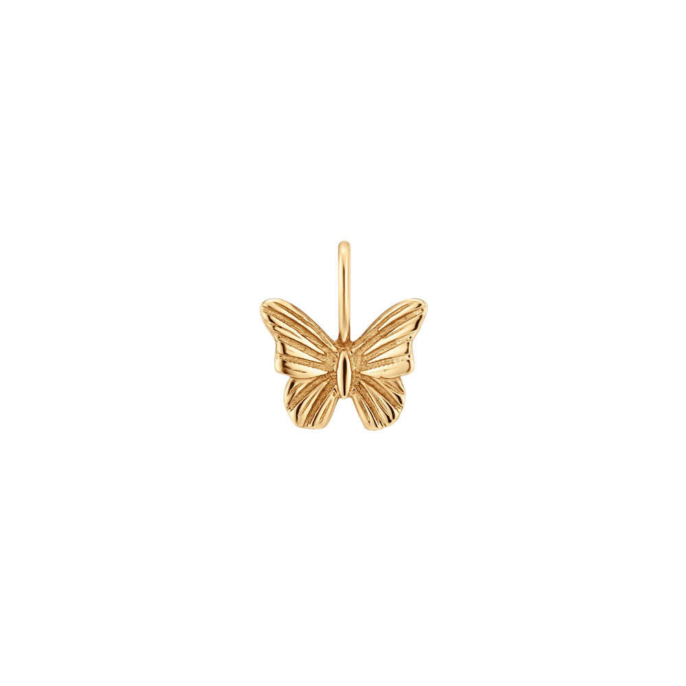 Fun and flirty, our Flutter charm is the perfect additional to your jewelry collection. This lovely butterfly charm will be sure to add some cheer to your look with it's delightful design.Material: 14K Solid GoldLength:7mmDrop Size:6.2*5mmThickness:0.6mmSold individually FLUTTER | Butterfly Charm