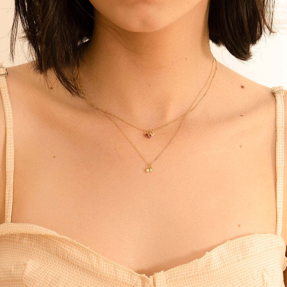 Personalize and add a little magic to your style with our delicate and dainty gemstone birthstone charms. Stack them together for a layered look or wear individually, for a touch of subtle elegance. Each piece will tell a story about your life. OCTOBER | Opal Necklace Charm