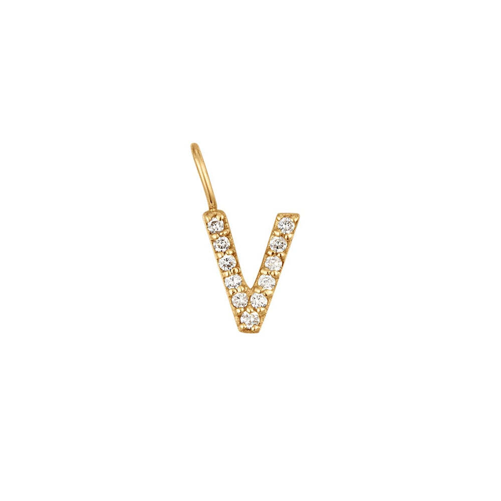 The Diamond Initial Charm, will add a touch of sparkle to your look. Each design is dainty, modern and playful. You’ll have so much fun personalizing, styling, stacking and showing off each piece.Material: 14K Solid GoldLetter Dimension: 6.3mm*4.9mmRing Diameter: 4mm*2.6mmStone Type: DiamondTotal Carat Weight: 0.056ct V | Diamond Initial Charm