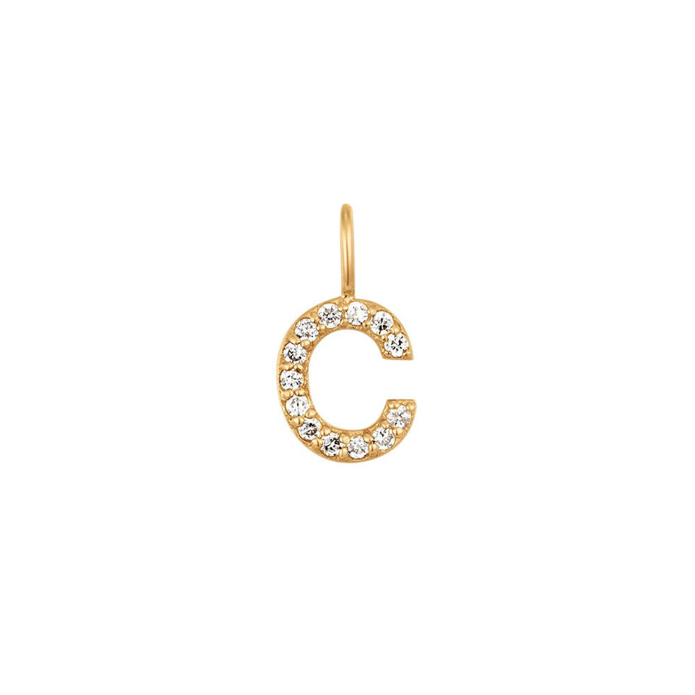 The Diamond Initial Charm, will add a touch of sparkle to your look. Each design is dainty, modern and playful. You’ll have so much fun personalizing, styling, stacking and showing off each piece.Material: 14K Solid GoldLetter Dimension: 6.2mm*5mmRing Diameter: 4mm*2.6mmStone Type: DiamondTotal Carat Weight: 0.065ct C | Diamond Initial Charm