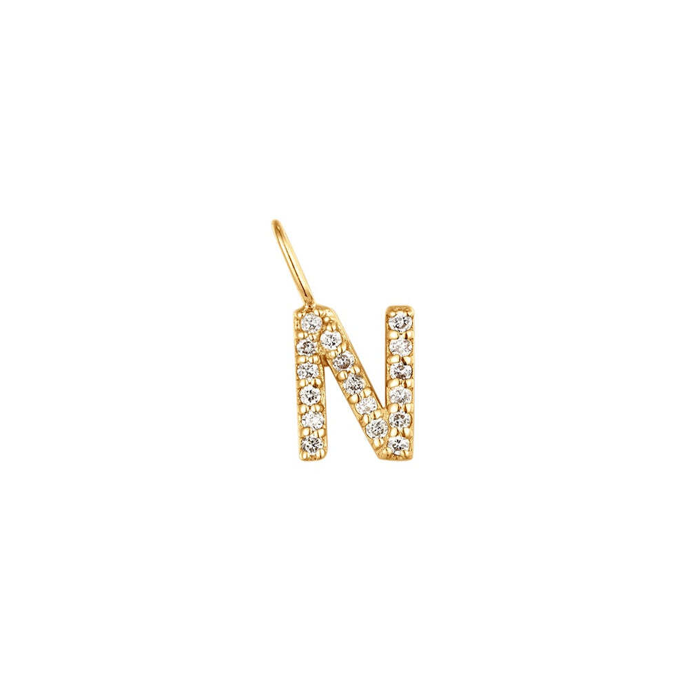 The Diamond Initial Charm, will add a touch of sparkle to your look. Each design is dainty, modern and playful. You’ll have so much fun personalizing, styling, stacking and showing off each piece.Material: 14K Solid GoldLetter Dimension: 6.3mm*4.8mmRing Diameter: 4mm*2.6mmStone Type: DiamondTotal Carat Weight: 0.085ct N | Diamond Initial Charm