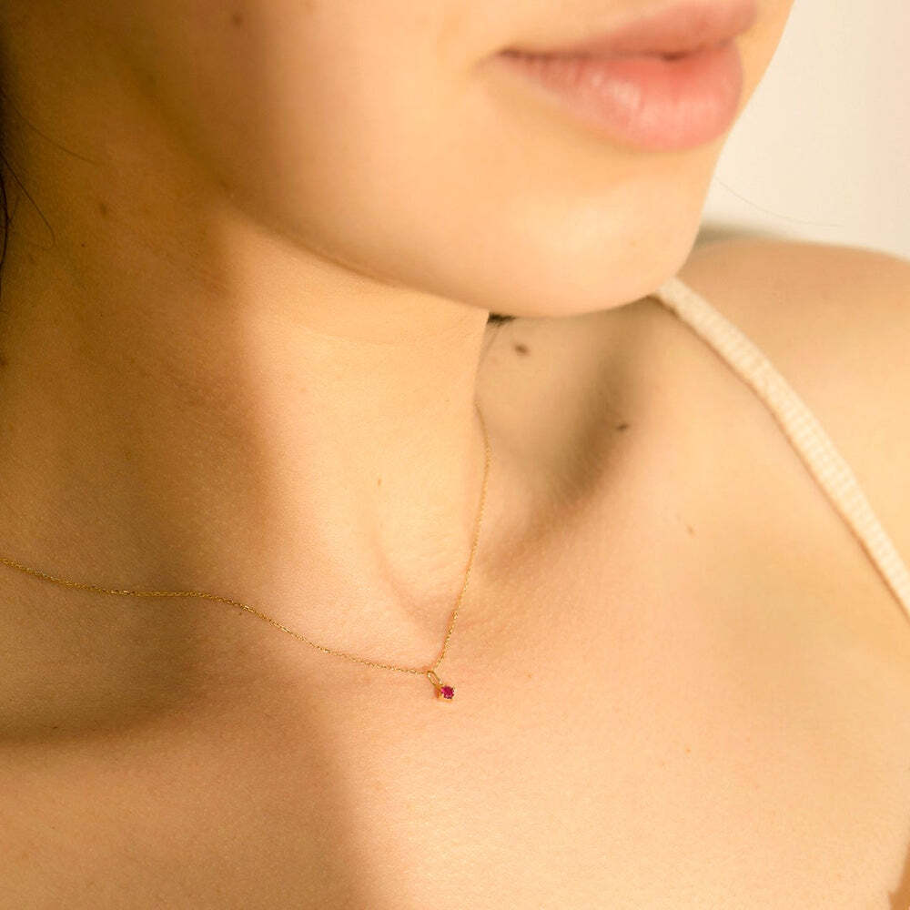 Personalize and add a little magic to your style with our delicate and dainty gemstone birthstone charms. Stack them together for a layered look or wear individually, for a touch of subtle elegance. Each piece will tell a story about your life.Material: 14K Solid GoldStone Size: 2.5mmRing Diameter: 4mm*2.6mmStone Type: Ruby JULY | Ruby Necklace Charm