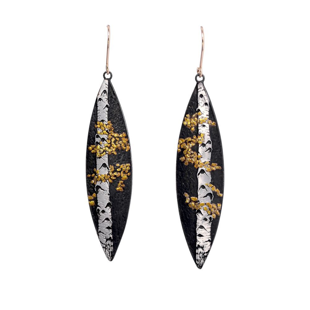Aspen beauties in an elegant marquis shape. Revel in the popping colors of fall in these delightfully unique earrings. Versatile to be worn anytime, any season. Aspen Duet Gold and Silver with 14K Earwires Earrings