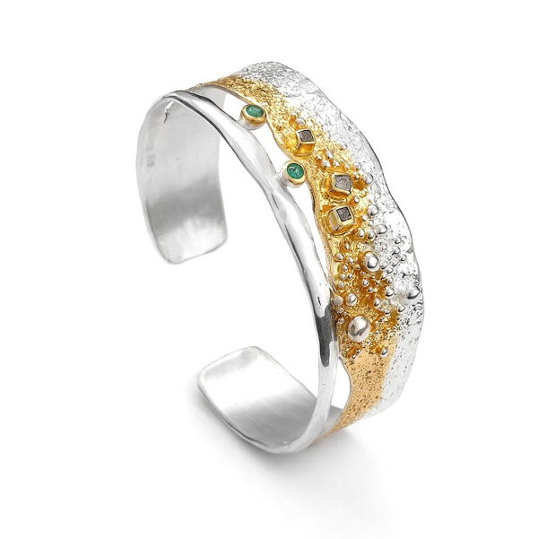 Closeup photo of Raw Diamond and Emerald Textured Sterling Silver and Gold Cuff Bracelet