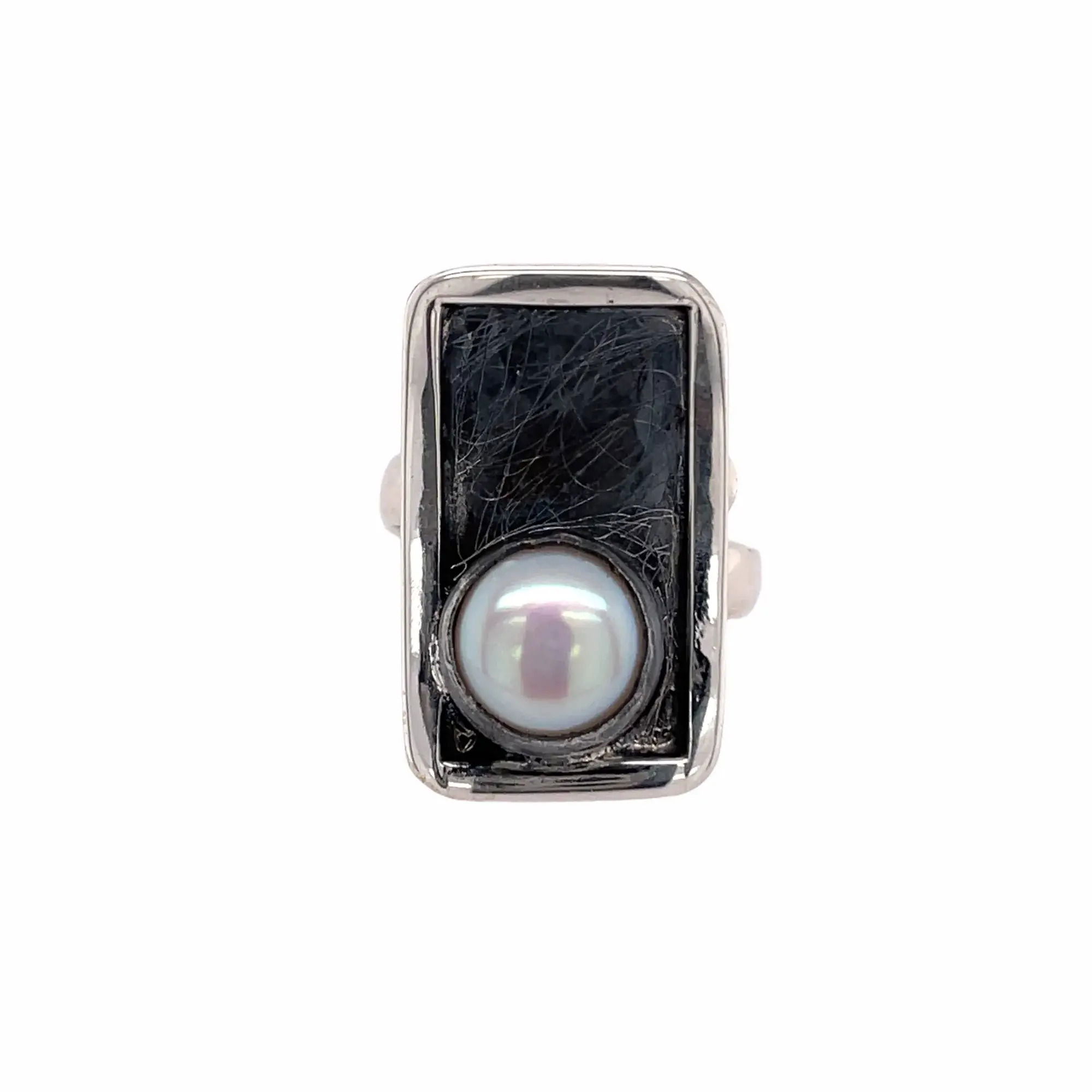 Sterling Silver Rectangle Plate approximately .5” w x 7/8” hSterling Silver Adjustable 1/8” Ring Shank.Freshwater Pearl 8mm Round.Handcrafted in Mexico with .925 Fine Sterling Silver. Silver Rectangle Ring with Pearl