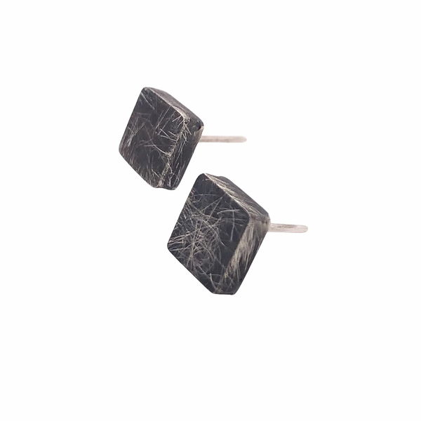 Closeup photo of Small Square Silver Studs Oxidized