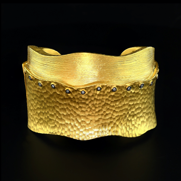 Closeup photo of DI .25 Two Texture Gold and SS Cuff with Hinge Bracelet