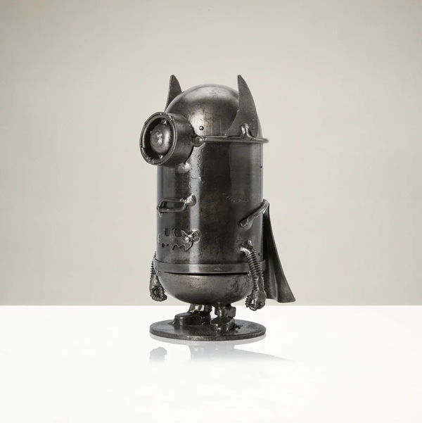 Closeup photo of Minion Batman Inspired Recycled Metal Sculpture