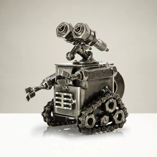 Closeup photo of 4" Wall-E Inspired Recycled Metal Sculpture