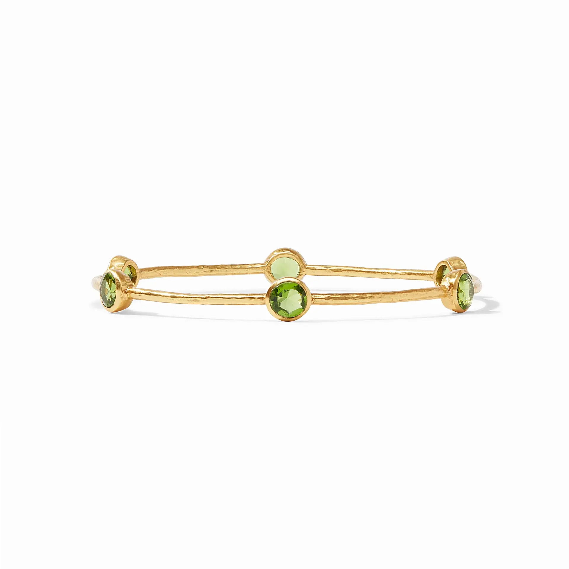 A lightly hammered bangle features six circular gemstones that sit along the length of this slim bangle, making it perfect for mixing and matching to create a striking color story on your wrist. Milano Bangle - Palmetto Green