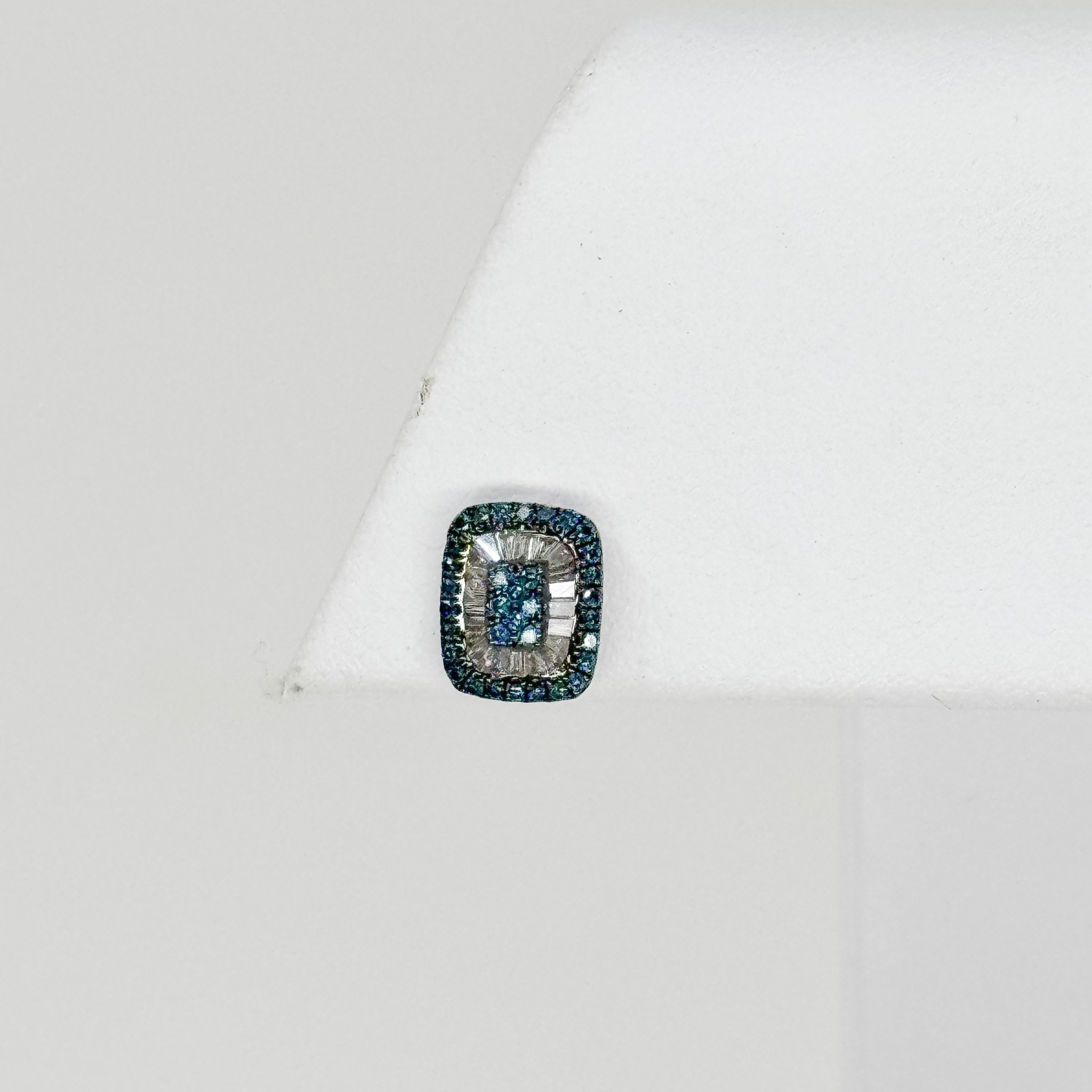 18kw Emerald Shape .15ct Blue Diamond with .23ct White Diamond Detail Earrings