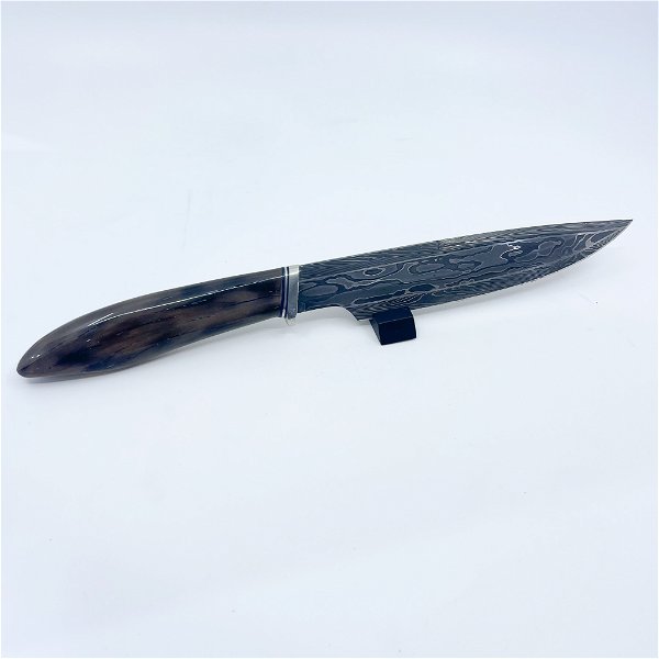 Closeup photo of Damascus Steel Knife with Sheath