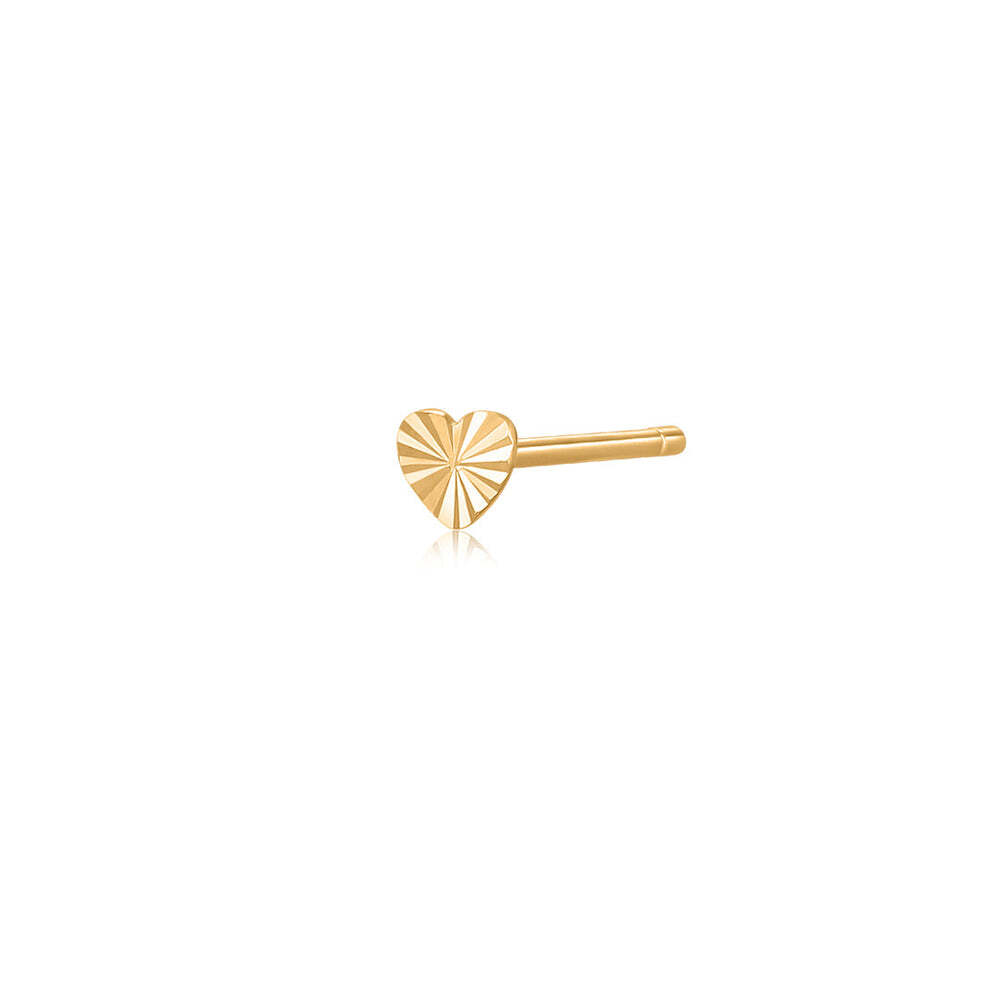 Hearts are always in fashion! This classic style is upgraded with a unique diamond cut design, for some originality and flair.Product Details:Material: 14K Solid GoldHeart Dimension: 3.5*3.1mmSold Individually DYLAN | Single Diamond Cut Heart Stud Earring