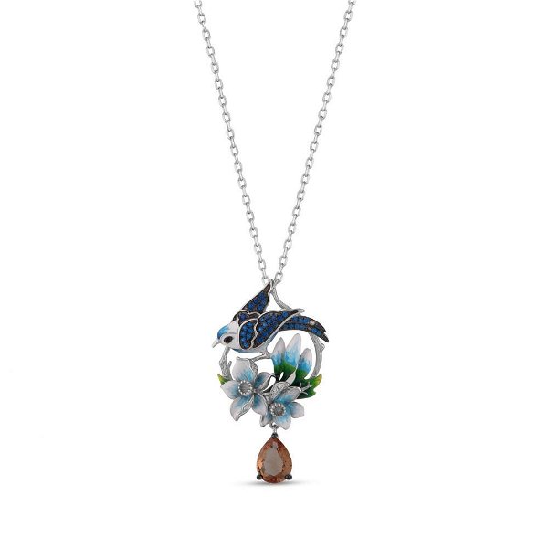 Closeup photo of Blue CZ Bird and Enamel Flowers, Zultanite Drop Sterling Silver Pendant on Adjustable Chain