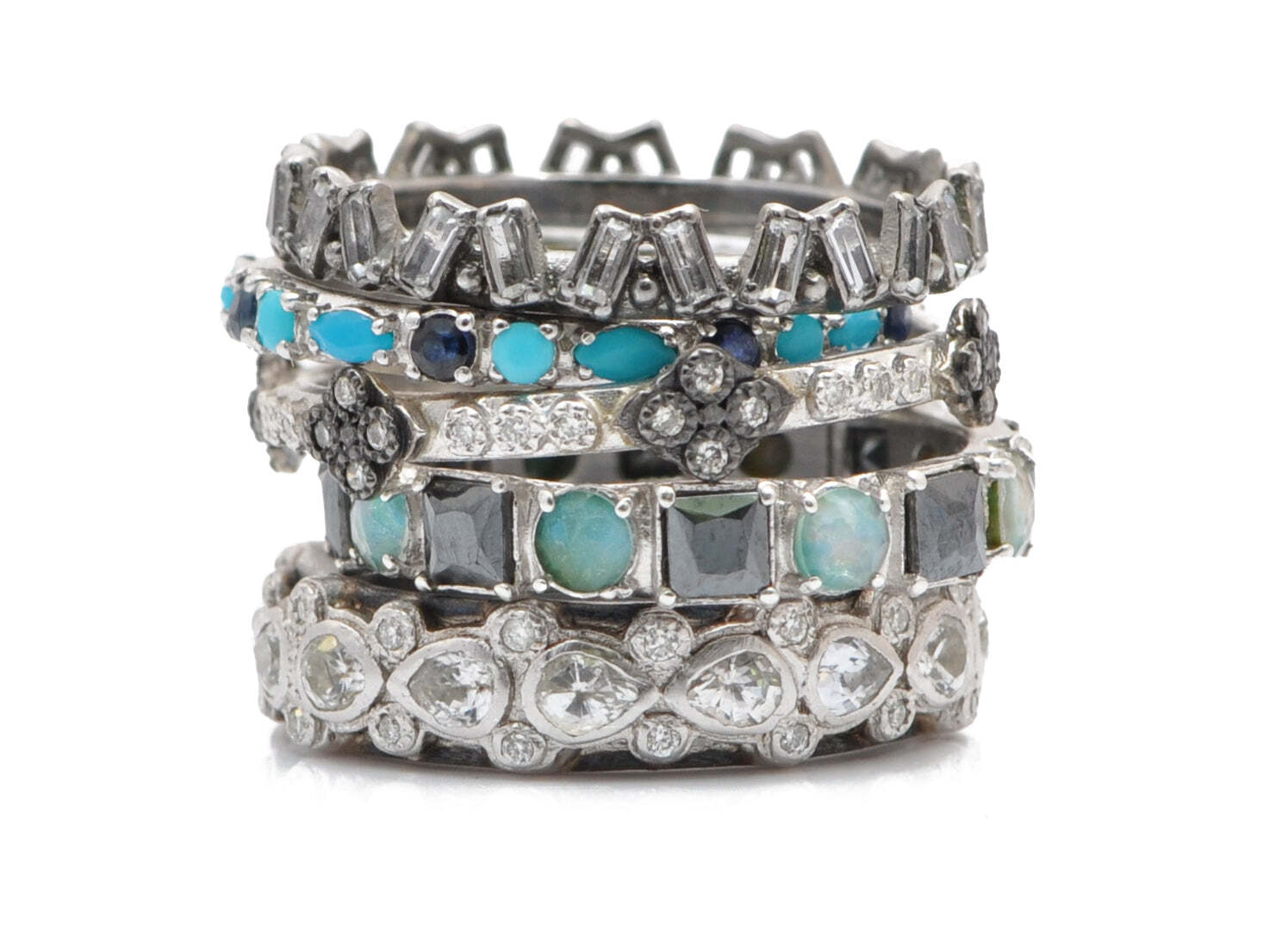 This sterling silver stack band ring is the perfect way to enhance your look. Its unique design features alternating 3MM square hematites, 3MM round Peruvian opal/white MOP/white quartz triplets. This ring is sure to bring you compliments with its unique and eye-catching design. The hematites provide a subtle sparkle and the Peruvian opal/white MOP/white quartz triplets will illuminate your look. Whether you're looking for a special gift or simply want to add a little shine to your own wardrobe, this stack band ring is sure to make an impact. Multi-Stone Stack Band Ring