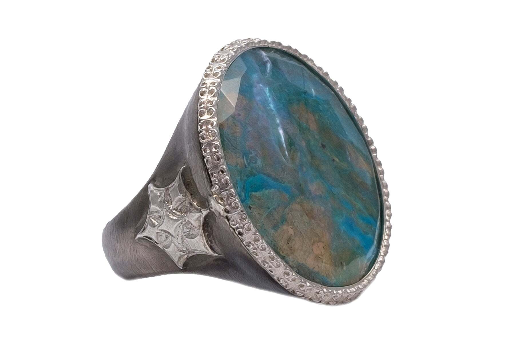 This Sterling Silver and Grey Sterling Silver 25MM Round Peruvian Opal/White MOP/White Quartz Doublet Ring with Crivelli Star Burst is a stunning piece of jewelry. The face width is 01.09" (27.70mm) and the band width is 0.25" (6.42mm). This gorgeous ring is a perfect addition to any outfit and perfect for any occasion. The combination of the Peruvian opal, white MOP, and white quartz creates an eye-catching shimmer that is sure to draw attention. This ring is a must-have item for anyone looking to add a touch of elegance to their style. Large Round Statement Ring