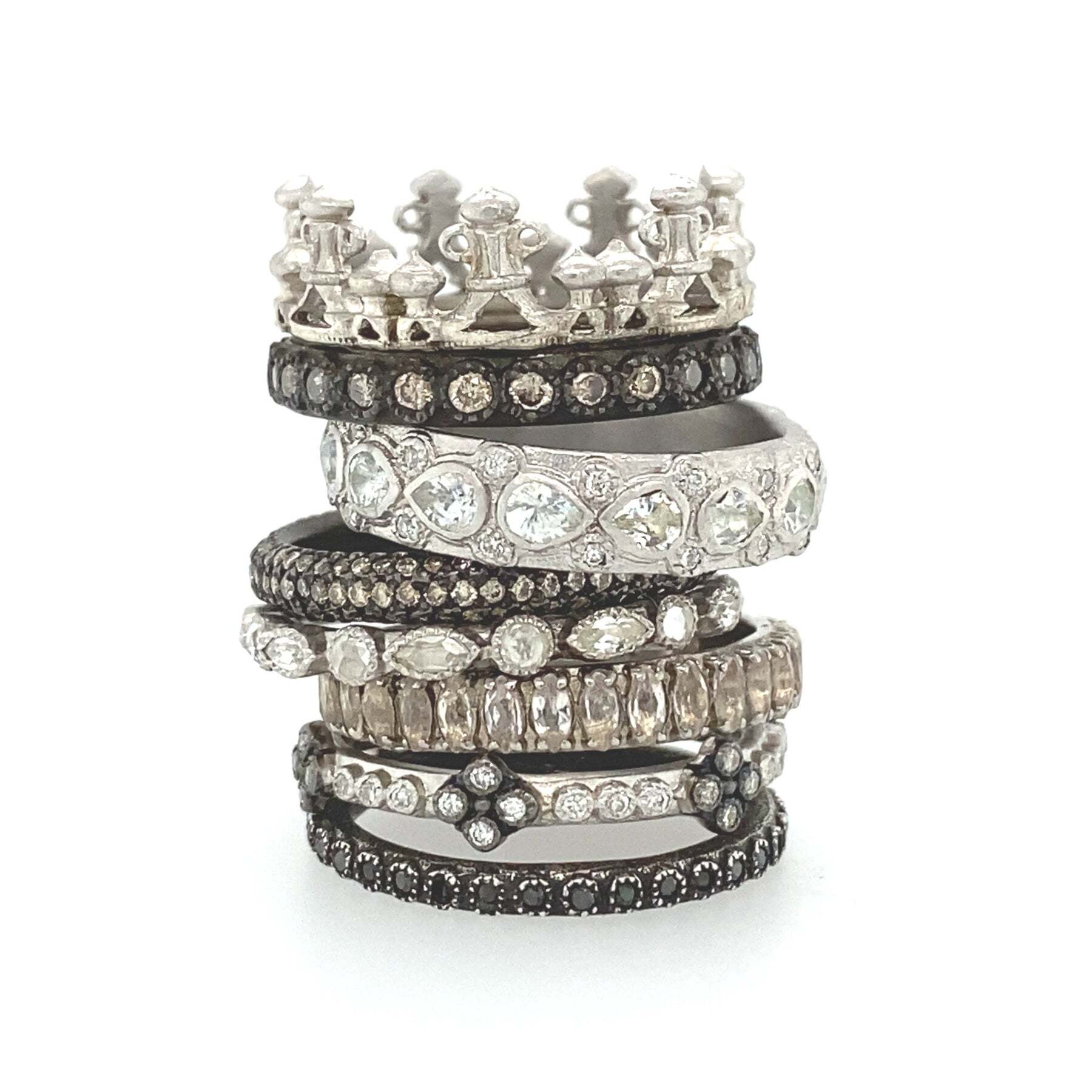 This sophisticated and stunning Sterling Silver and Blackened Sterling Silver Crown Stack Ring with Champagne Diamonds is the perfect addition to any jewelry collection. The Sterling Silver and Blackened Sterling Silver Crown Stack Ring is intricately crafted with beautiful detail, featuring a 0.20 TCW of stunning champagne diamonds, adding a luxurious sparkle to your look. This stunning piece of jewelry is the perfect way to add a hint of luxury to your look and make a statement. Crown Stack Band Ring
