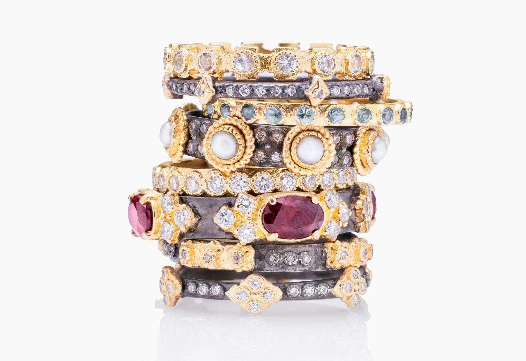 Modern elegance meets timeless style in this exquisite 18K yellow gold and blackened sterling silver Cultured Pearl Stack Band Ring. Showcasing fresh water and champagne diamonds, this stunning ring is highlighted by round brilliant-cut diamonds (0.16 TCW) and features a unique band width of 0.15" (3.96mm) and station width of 0.21" (5.47mm). Perfect for adding a touch of glamour to any look, this ring is the perfect way to add a bit of luxe to your collection. Pearl and Champagne Diamond Stack Band Ring