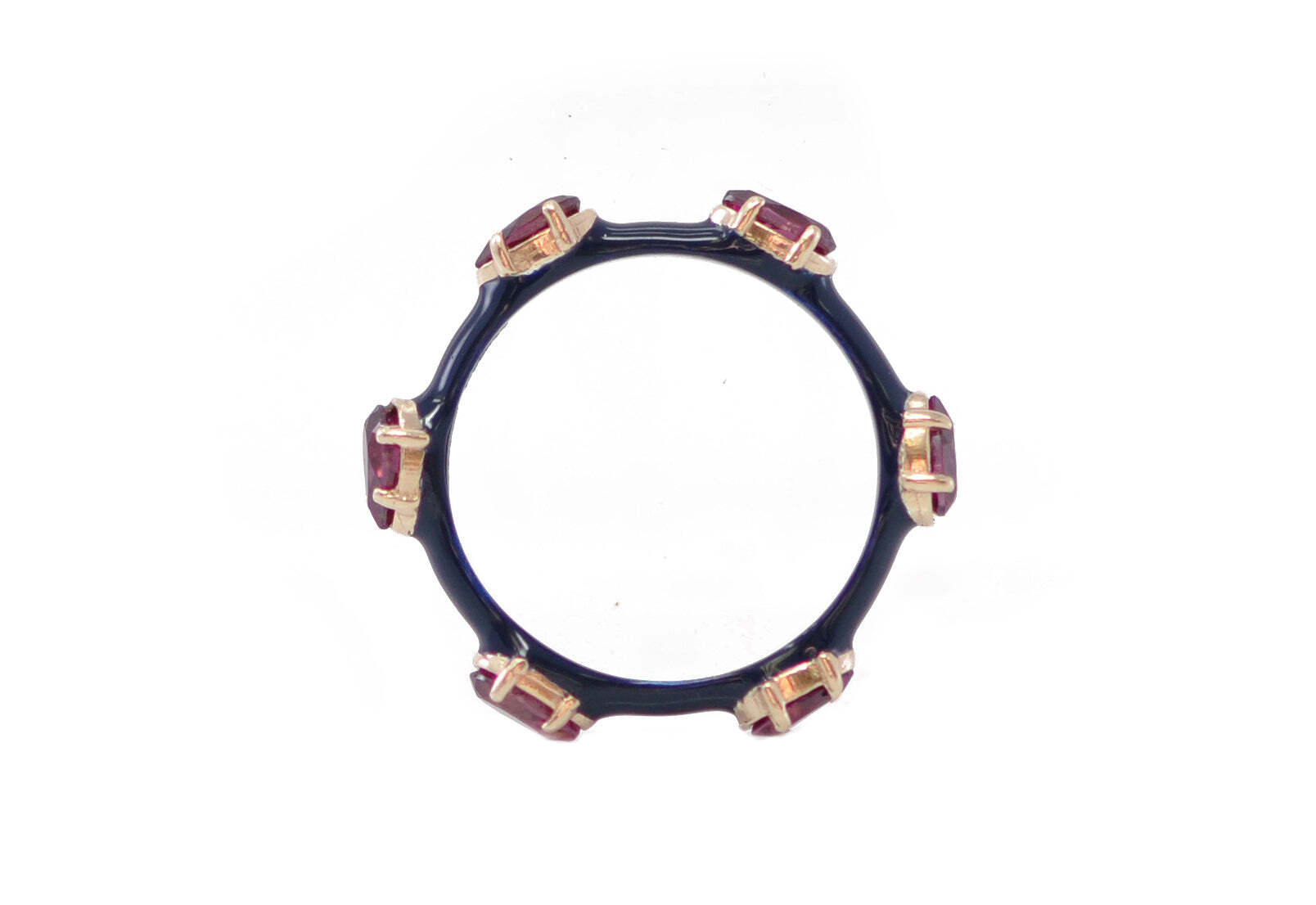This 14k rose gold and blackened sterling silver stack band is a stunning accessory that will add a timeless elegance to any ensemble. Adorned with unique dark blue enamel and oval purple garnets, this ring will bring a sparkle of color to your wardrobe. The blackened sterling silver finish adds a subtle contrast, making for a truly eye-catching piece. This beautiful band is the perfect way to add a touch of sophistication to any look. Enamel with Garnet Stations Stack Ring