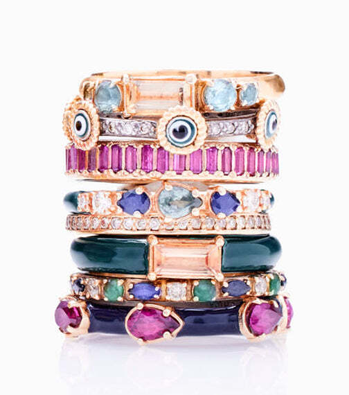 Sophisticated and graceful, this stunning stack band is a classic addition to any jewelry collection. Crafted from 14K rose gold and sterling silver, this vintage band features an intricate green enamel finish garnished with white diamonds and sapphires for a hint of sparkle. The perfect piece for any special occasion, this feminine band will have you looking and feeling like royalty. Vintage Green Enamel Stack Ring