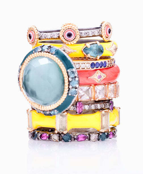 This stunning stack band features an exquisite combination of 14k Rose Gold and Blackened Sterling Silver with a yellow enamel finish. Its intricate crivelli design adds elegance and luxury to the piece and is further accented with twinkling London Blue Topaz and Champagne Diamonds. Not only is this stunning stack band a classic and timeless piece, it will also bring a hint of glamour and style to any outfit. An ideal addition to any jewelry collection, this beautiful band will be enjoyed for years to come. Yellow Enamel Stack Ring