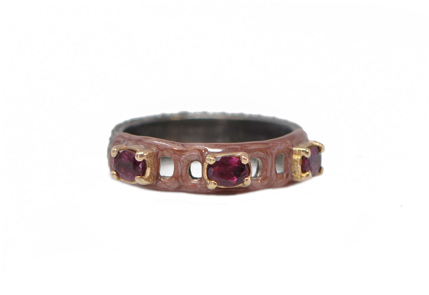 This one-of-a-kind ring is crafted with 18k yellow gold, grey sterling silver, and seductive poetry enamel. The ring is also set with an oval purple rhodolite gemstone, encircled with a halo of glittering diamonds. Its exquisite colors provide a contrast that is simply mesmerizing. Let this beautiful ring whisper sweet nothings to you, and complete your favorite looks with a one-of-a-kind addition. ENAMEL PAPERCLIP STACK RING