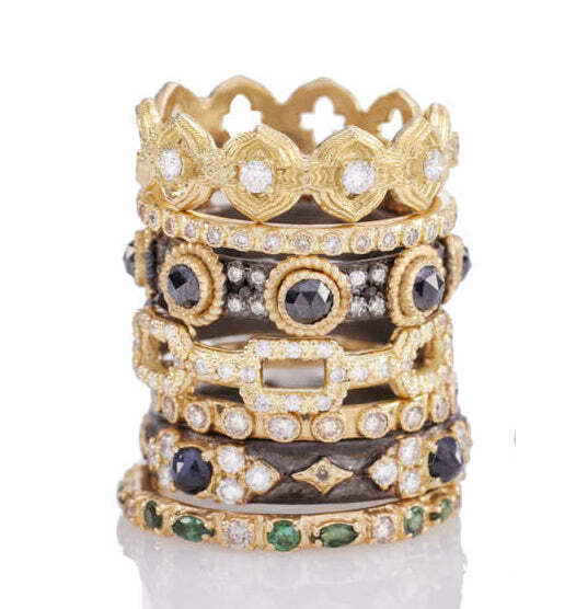 This stunning 18k yellow gold scroll diamond ring is sure to adorn you with sophisticated beauty. Crafted with 0.17 carats of white diamonds, the attractive design is perfect for any special occasion. The intricate scroll pattern is offset by glistening diamonds and is sure to add sparkle to your ensemble. With its timeless design, this ring is the perfect way to capture a timeless and classic look. SCROLL DIAMOND STACK RING