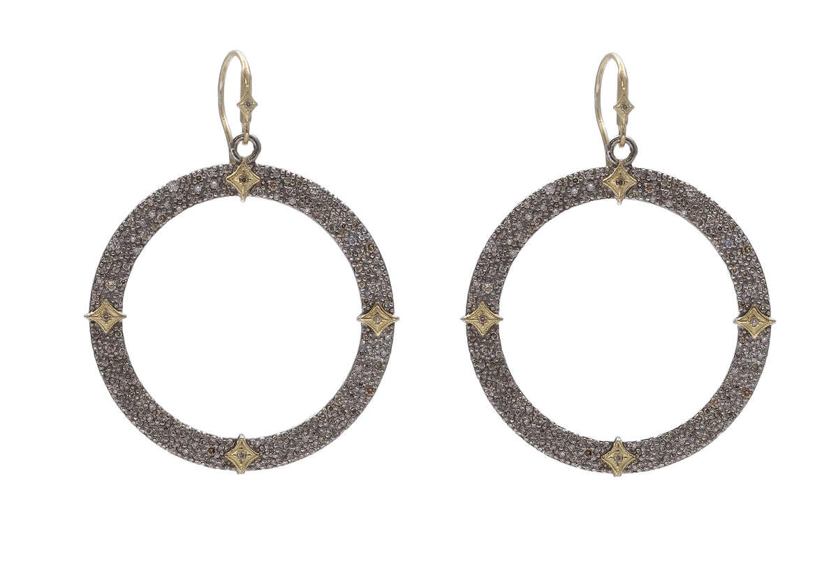 A perfect balance of chic and elegant, these 18K Yellow Gold and Grey Sterling Silver Open Circle Pave Champagne Diamond Drop Earrings with Crivelli Detail (2.08 TCW) will quickly become your everyday go-to piece. Perfect for adding a subtle yet luxurious touch to all your looks, these earrings feature a sleek open circle shape pavéd with shimmering champagne diamonds for a subtle, yet impactful look. Finished with Crivelli details for added texture and contrast, these earrings are the perfect addition to all your evening looks. Pave Open Circle Drop Earrings