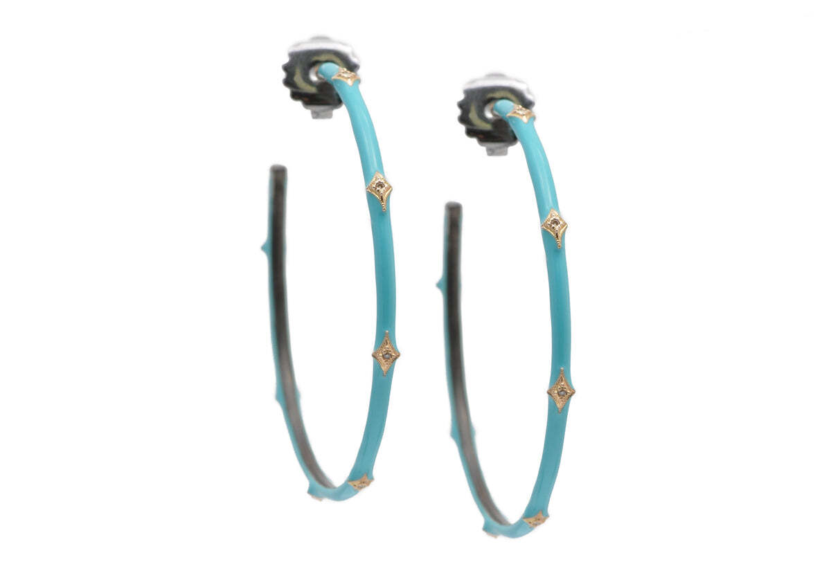 innovation, reminds us of our talents & joy of life.These stunning Contemporary and Geometric Crivelli Turquoise Enamel Hoop earrings are designed to add a perfect touch of luxe to your day-to-day wardrobe. Featuring sleek and pure white enamel adorned with several 14kt rose gold modern Crivellis elements and set with round champagne diamond for a subtle sparkle, these earrings are perfect for any modern woman looking to add elegance to her look. The Crivelli symbol is a reminder of our talents and the joy of life, making these earrings not just beautiful, but meaningful too. Perfect for everyday wear, these earrings will soon become a wardrobe go-to. Crivelli Turquoise Enamel Hoop Earrings
