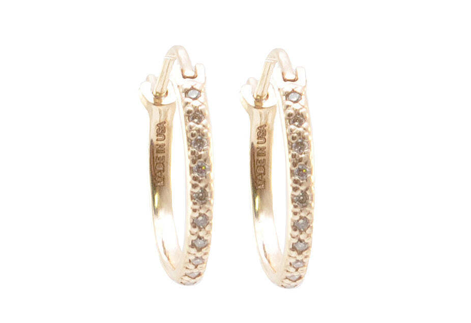 These glamorous 14k Rose Gold 16MM Hoop Earrings with Champagne Diamonds are the perfect touch of elegance to any outfit. Crafted with the finest quality materials, these stunning earrings feature natural 0.12 TCW elegant champagne diamonds set on a beautiful rose gold hoop. The unique color of the champagne diamonds creates an eye-catching effect when they catch the light. Add a touch of sophistication to any look with these sophisticated hoop earrings. Champagne Diamond Huggie Hoop Earrings