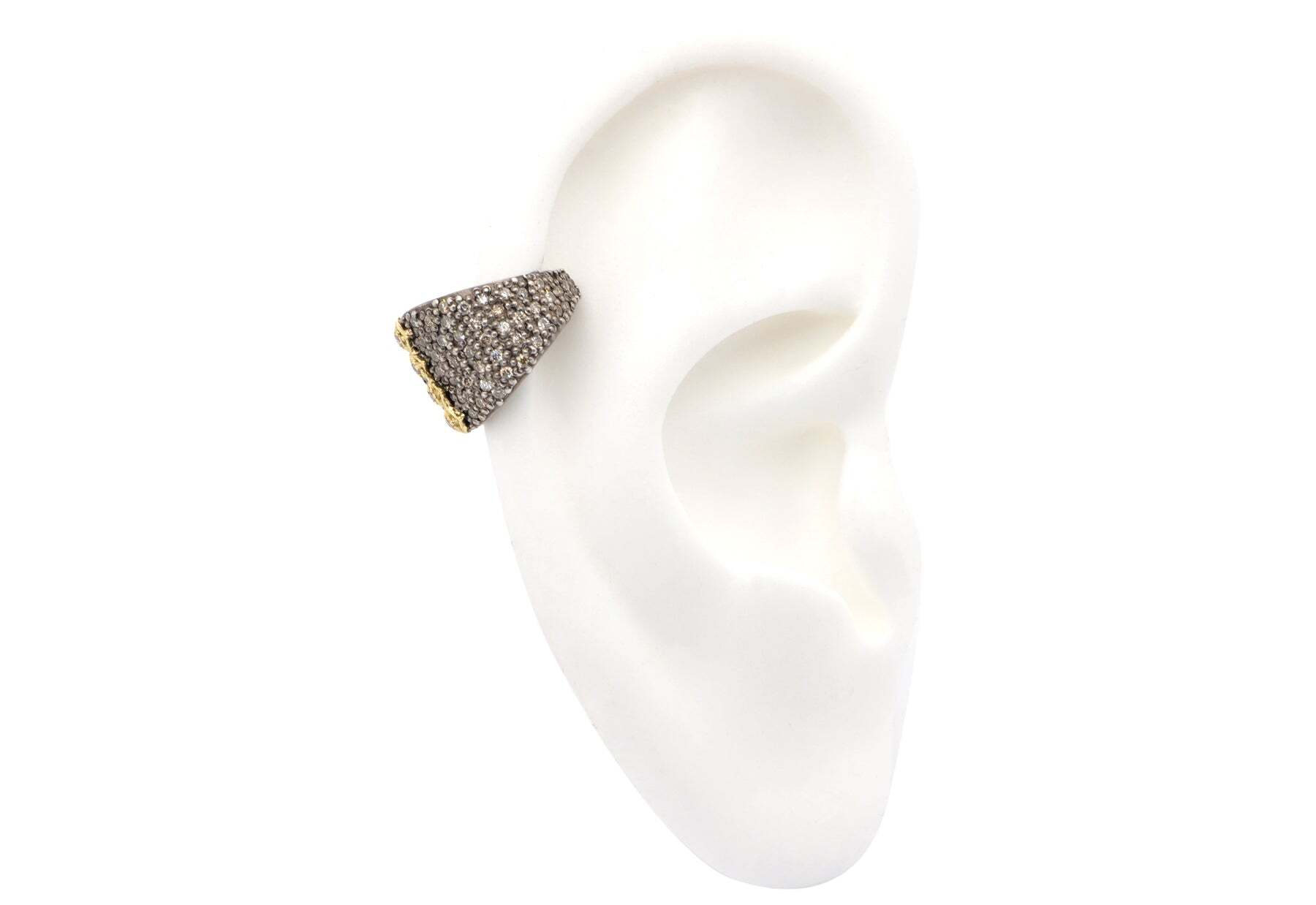 This elegant ear cuff is a showstopper. Crafted of 18K yellow gold and grey sterling silver in a classic medium pave Crivelli design, the cuff is further accented with twinkling white and champagne diamonds (0.25 TCW). This piece is sure to garner compliments and make a statement wherever you go. Sure to be a favorite in any jewelry collection, this ear cuff is perfect for a night out or to dress up a casual look. Pave Ear Cuff