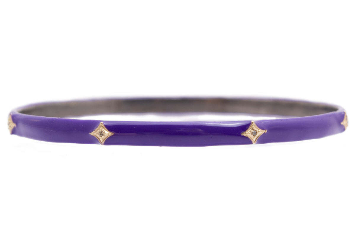 This stunning 14K rose gold and blackened sterling silver Crivelli bangle bracelet is as unique as it is beautiful. The exquisite purple enamel detailing is accentuated with sparkling white diamonds (0.03 TCW) to give this bracelet an extra touch of glamour. Whether pairing with a simple dress or cocktail attire, this dazzling piece will be a favorite go-to accessory in your jewelry collection. The perfect balance of classic detail and modern design make this Crivelli bangle bracelet a must-have. Crivelli Purple Enamel Bangle Bracelet