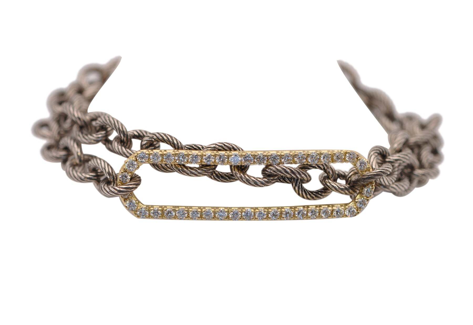 This spectacular 18k Yellow Gold and Grey Rhodium finish Sterling Silver double wrap chain bracelet will add a touch of glamour to any outfit. It is adorned with a diamond pave paperclip center piece, beautifully set with 0.82 TCW white diamonds. For convenience and comfort, it is equipped with a toggle closure that is adjustable at 13" and 13.5" to fit any wrist size, and measures 29.4mmx7.9 mm. This exquisite piece of jewelry is sure to turn heads every time you wear it. DOUBLE WRAP PAVE PAPERCLIP ID BRACELET