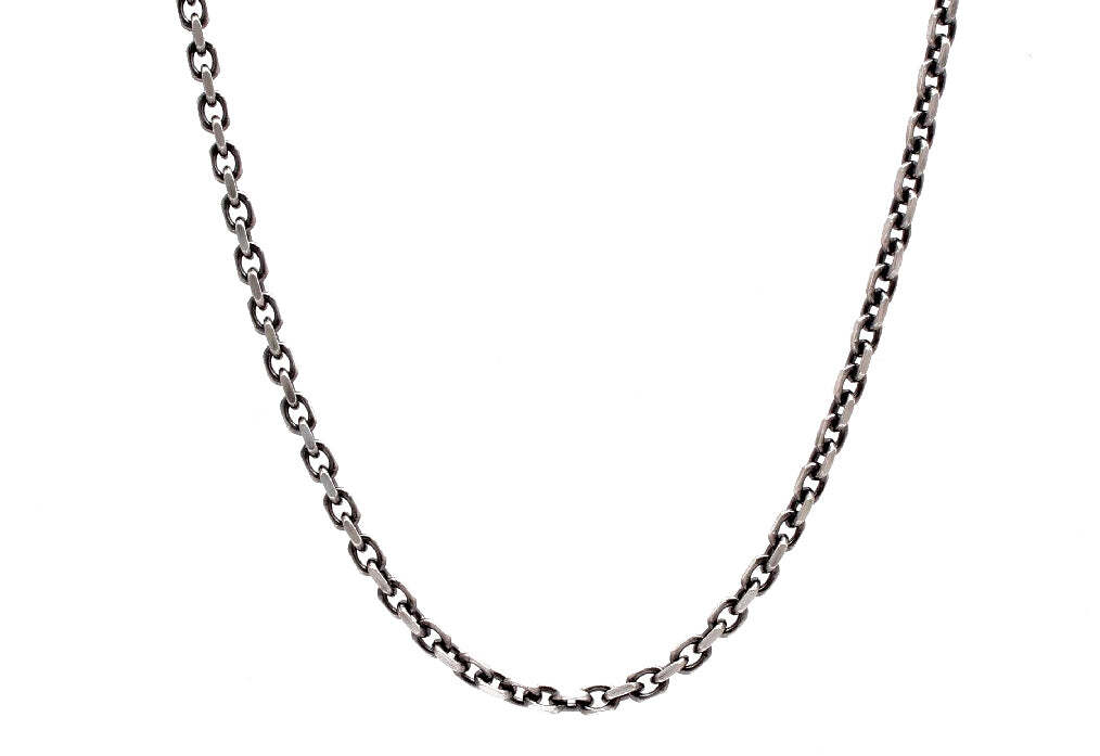 This versatile sterling silver 20" box chain is perfect for any occasion. The adjustable feature allows you to change the length to 16", 18" and 20", so you can customize your look. The blackened finish gives the chain a modern and sleek look, making it the ideal accessory for everyday wear. Whether you choose to wear it alone or with one of your favourite pendants, this chain will be sure to turn heads. Box Chain Necklace