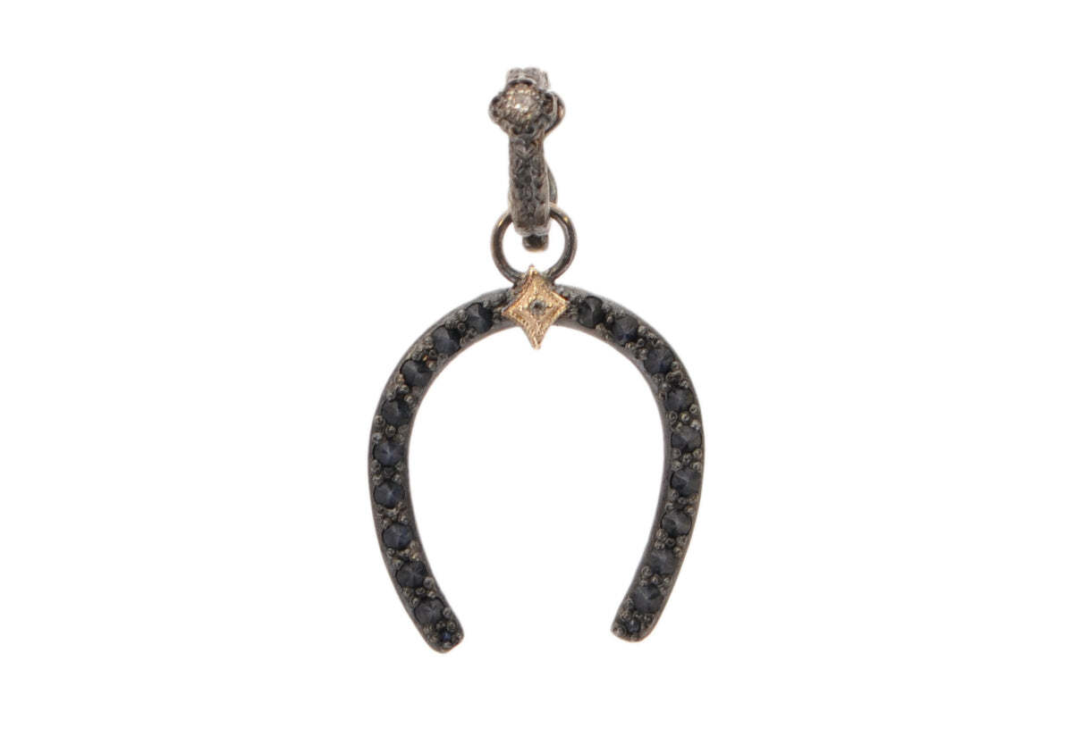 Celebrate your unique style with this dazzling 14k rose gold and black rhodium-finished sterling silver pendant. The 25mm pave horseshoe element on bale sparkles with 0.02TCW round champagne diamonds and black sapphires. The pendant measures 34x20 and the horseshoe element measures 25mm. This statement piece is the perfect accessory for any look. 25MM BLACK PAVE HORSESHOE