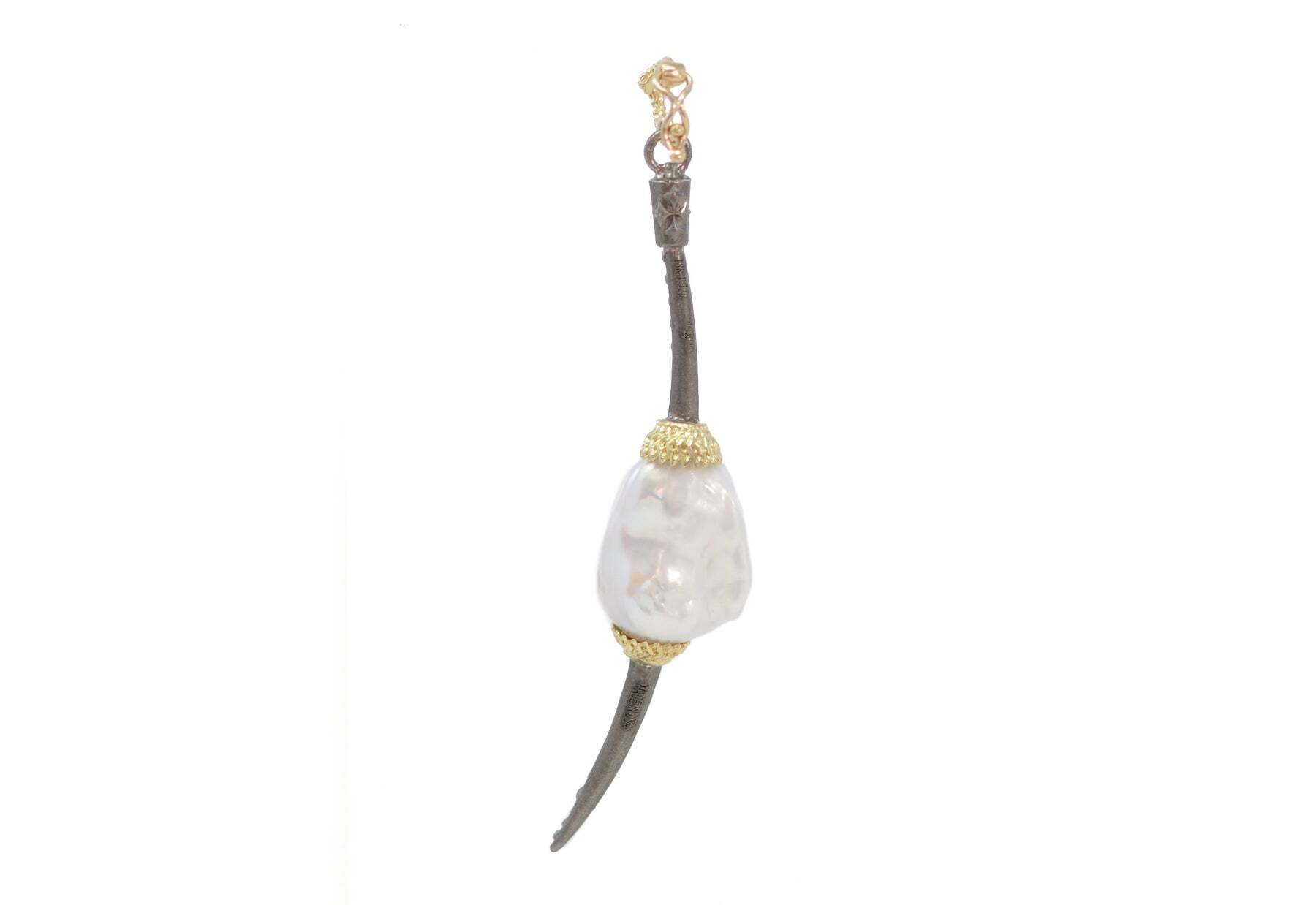 This beautiful piece of jewelry will be sure to catch everyone's attention. This enhancer is crafted from 18k yellow gold and grey sterling silver for a unique two-tone look. The enhancer is adorned with a baroque pearl station and accented with champagne diamonds for added sparkle. It will make the perfect accessory to add a touch of sophistication and elegance to any outfit. A great addition to your jewelry collection, this enhancer is sure to make a lasting impression. Pave Horn with Pearl Station Enhancer